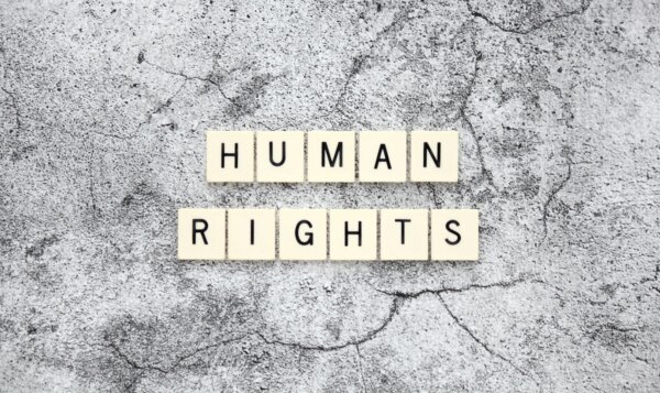 human-rights-word-tiles-on-a-cracked-concrete-background