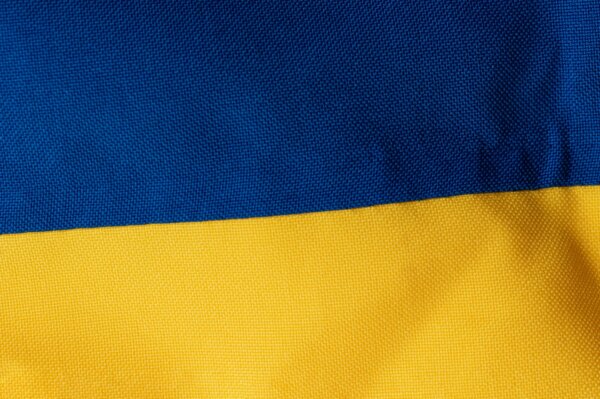 ukrainian-flag-background-national-flag-of-ukraine-close-up-yellow-blue-textured-background