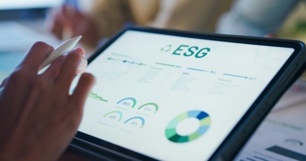 closeup-group-asia-businesspeople-talk-esg-strategies-risk-management-workshop-night-