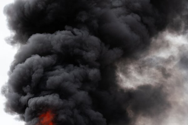 view-of-black-motion-blur-clouds-of-strong-fire-smoke-covered-sky