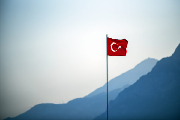 turkish-flag-waving-on-the-wind-with-mountains-in-2024-12-08-00-23-17-utc-2048×1367-1