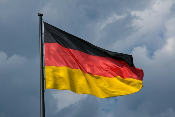 german-flag-in-front-of-dark-clouds