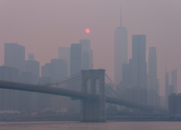 downtown-manhattan-at-sunset-on-a-smoky-day-2026-03-15-23-29-58-utc-2048×1463-1
