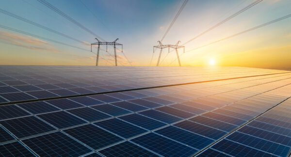 solar-panels-and-power-lines-at-sunset-2026-03-16-02-06-18-utc-2048×1111-1
